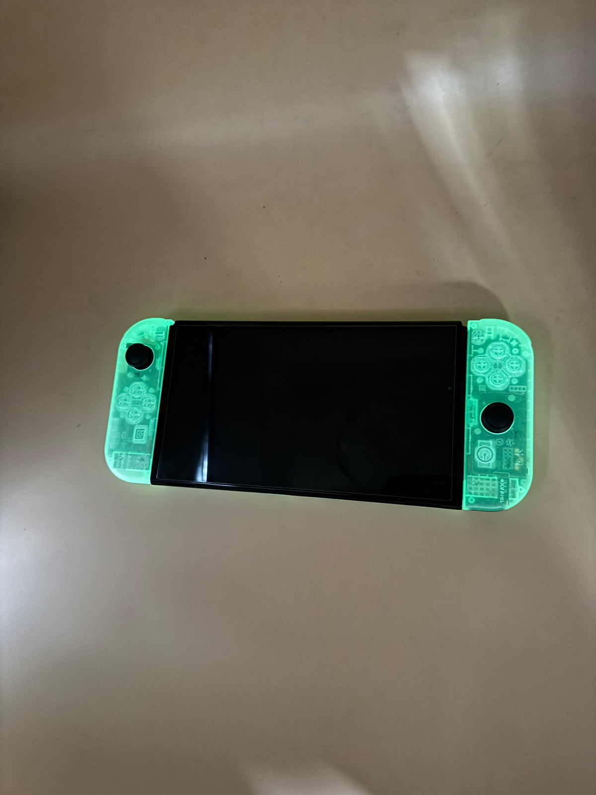 Nintendo Switch OLED CiB with customized Glow in the Dark Shell and Joy-Cons