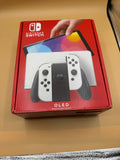 Nintendo Switch OLED CiB with customized Glow in the Dark Shell and Joy-Cons