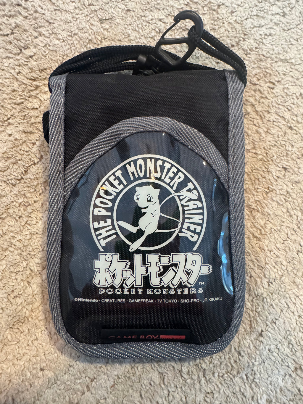 Vintage 1990s Japanese Nintendo Game Boy Pocket carrying pouch featuring Mew from the "Pocket Monsters Trainer" line