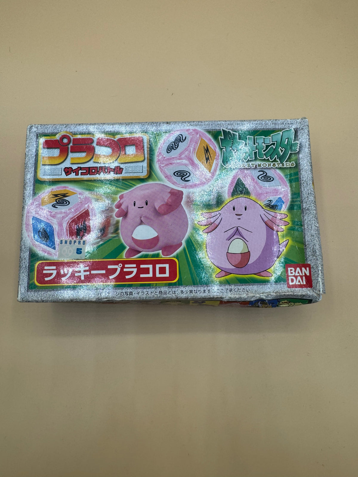 Vintage 1998 Bandai Pokémon Plakoro (Placolo) Dice Battle Game set featuring Chansey