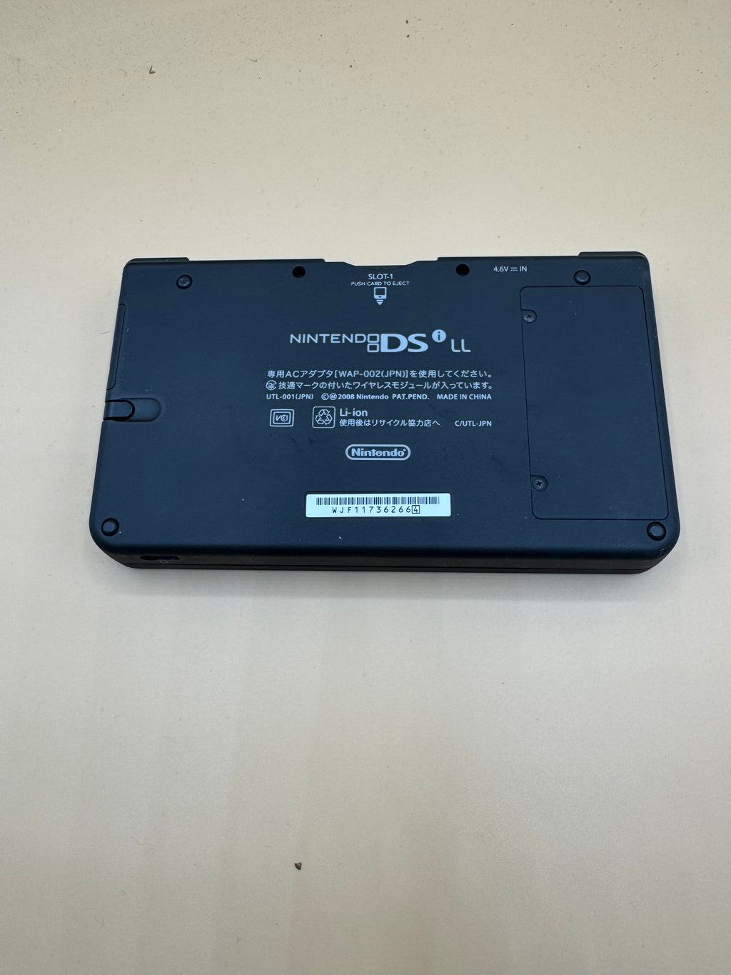 Green Nintendo DSi XL/LL (Japanese import-plays English games in English)