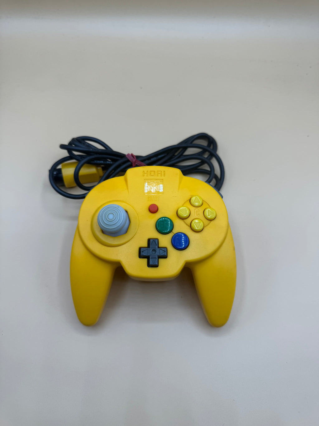 Yellow Hori Pad Mini 64 (Japanese import)