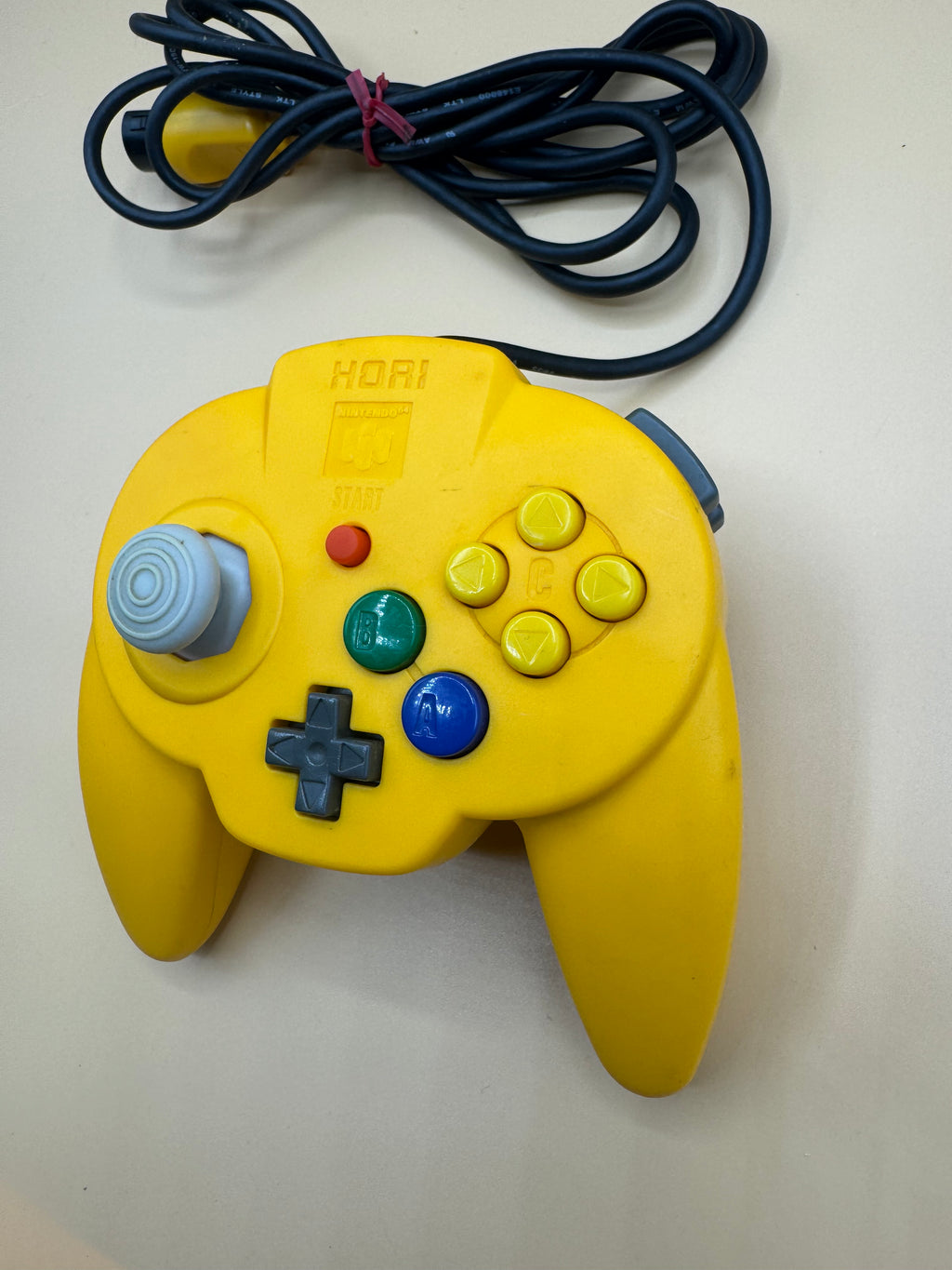Yellow Hori Pad Mini 64 (Japanese import)