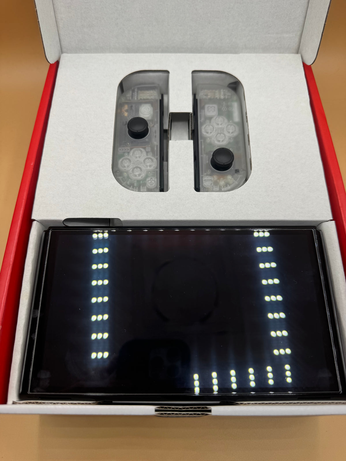 Nintendo Switch OLED CiB with customized Glow in the Dark Shell and Joy-Cons