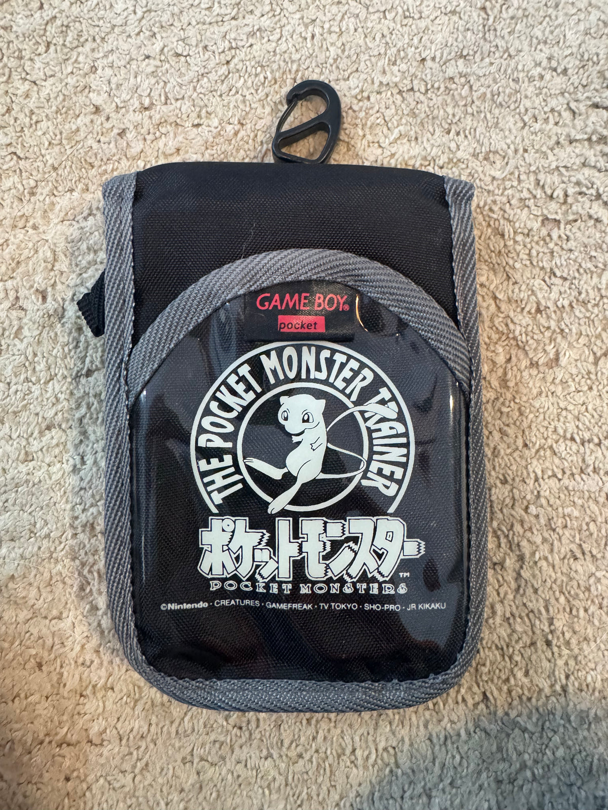 Vintage 1990s Japanese "The Pocket Monster Trainer" Game Boy Pocket carrying case featuring Mew