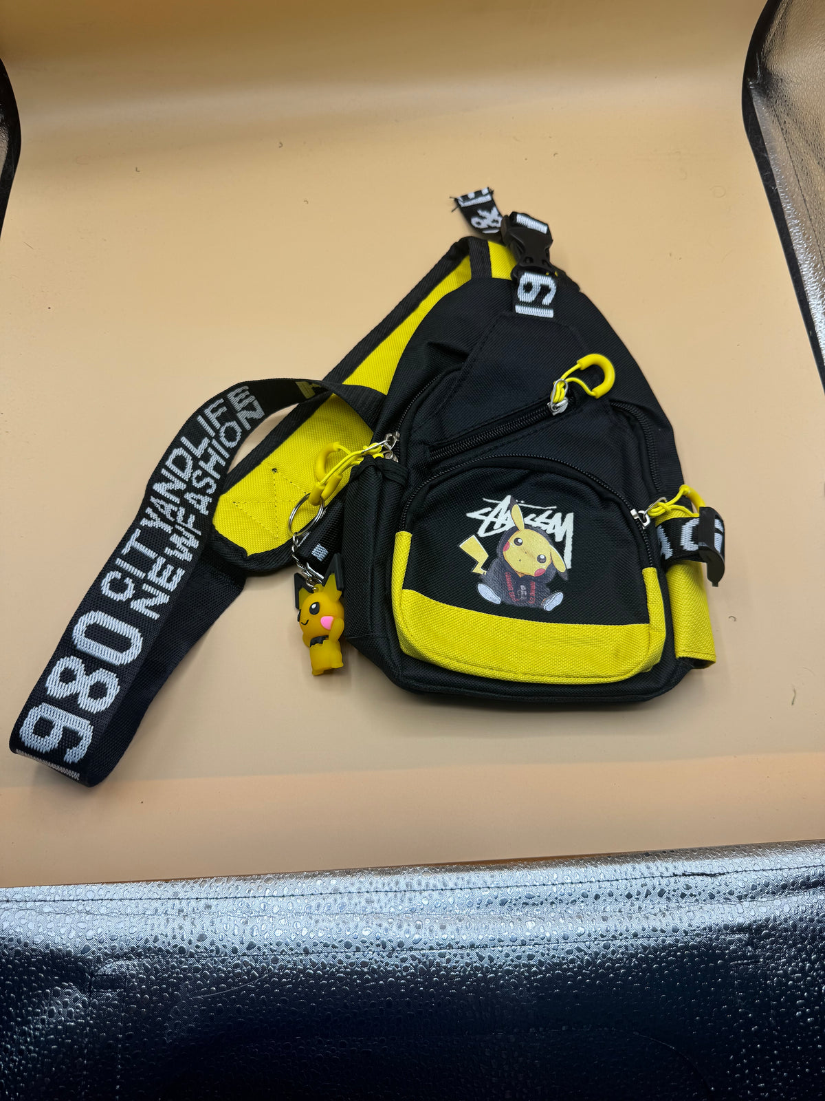 Stussy x Pokémon Pikachu sling bag