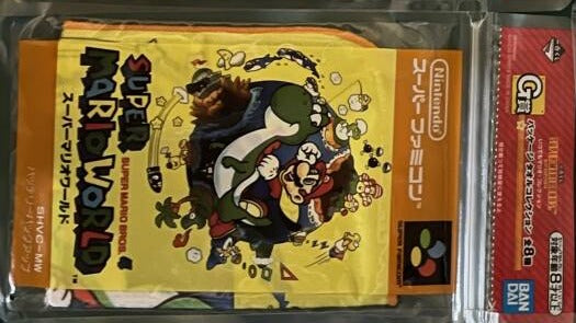 Ichiban Kuji Prize G package towel — Super Mario World (Super Famicom) design in zipper bag