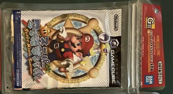 Ichiban Kuji Prize G package towel — Super Mario Sunshine (GameCube) design in zipper bag